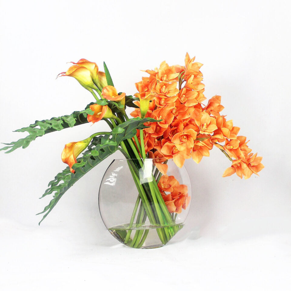 Orange Cymbidiums and Mango Callas in Moon Vase