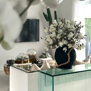 White Magnolia Arrangement in Matte Black Ceramic Vase