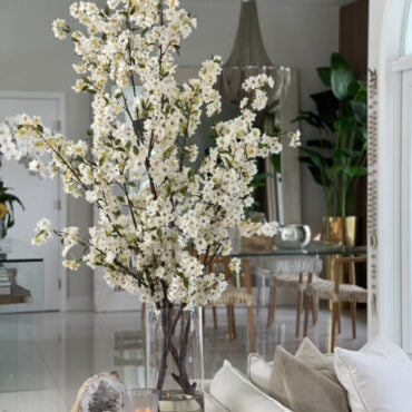 Tall White Blossom Branch Arrangement in Clear Glass Vase