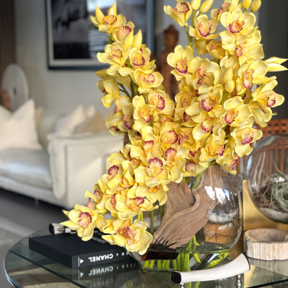 Yellow Cymbidiums in Moon Vase