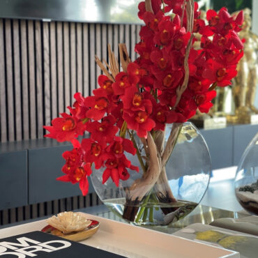 Red Cymbidiums in Moon Vase