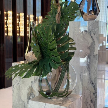 Modern Monstera Leaf Sculpture in Oval Glass Vase